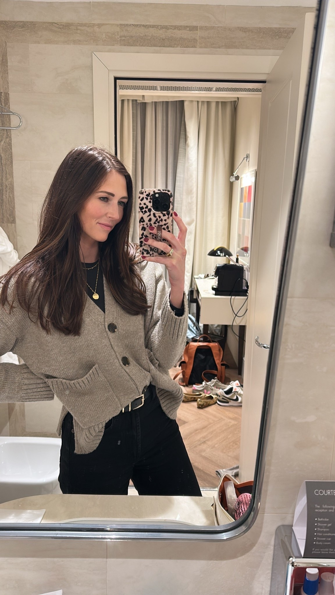 Cardigan
Black long sleeve tshirt
Black wide leg jeans
Black belt


#LTKootd #LTKTravel