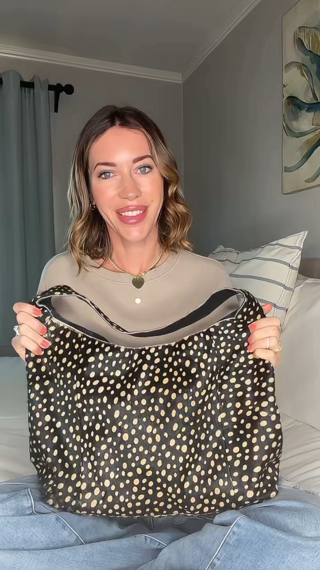 Repeat bag offender reporting for duty 👋🏻

The Lindsey Hair On in bambi print = fashion moment ➕ real-life function. She fits my everyday essentials and MOORE. ✨ 

#LTKdayinmylife #LTKmomlife #LTKvlog