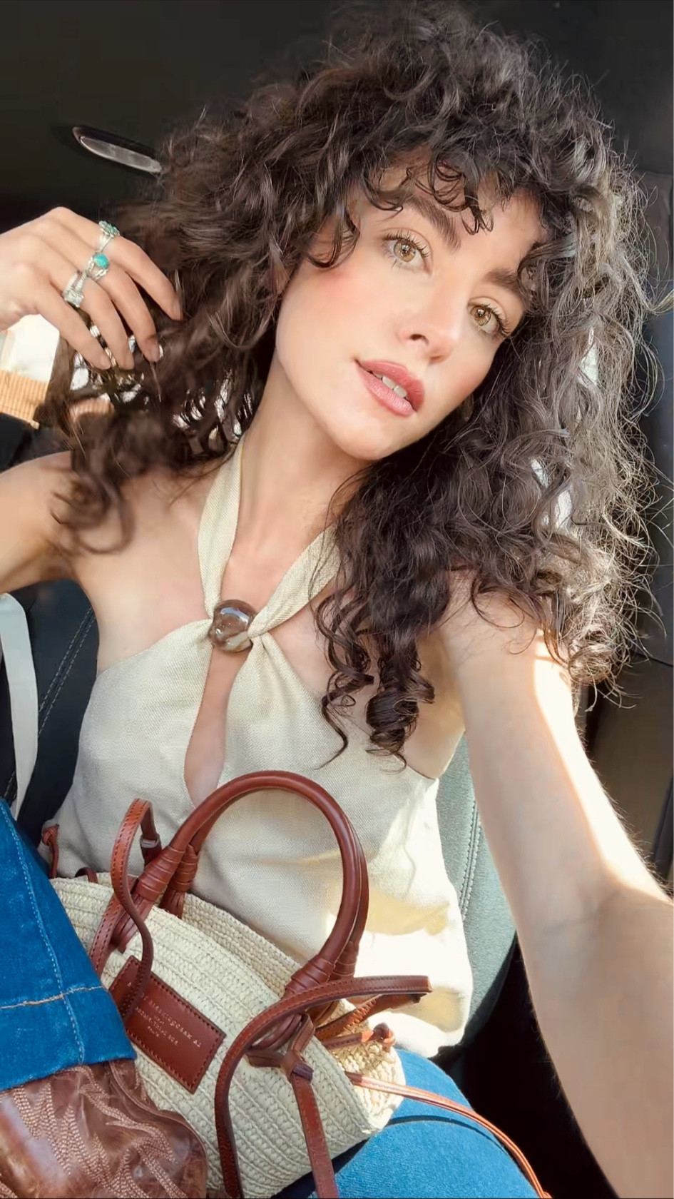 Love this halter and basket bag combo 🧡 paired it with flares, obviously haha 

 summer outfit / jeans / basket bag 

#LTKSeasonal #LTKFestival