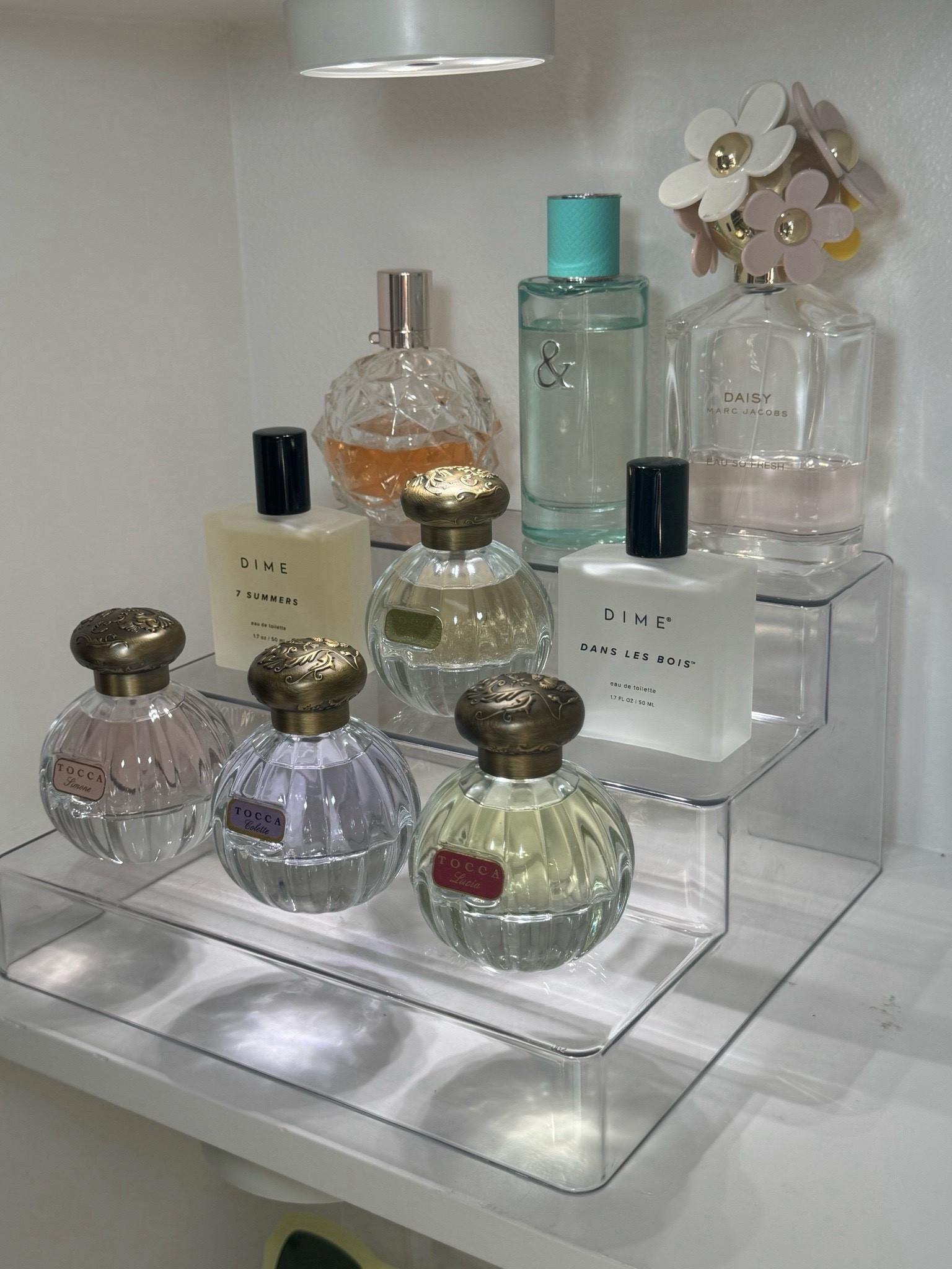 Perfume collection 🍉🍒🤍

#perfume #organization #yslbeauty #dimebeauty #tiffanyandco

#LTKGiftGuide 

#LTKU #LTKBeauty