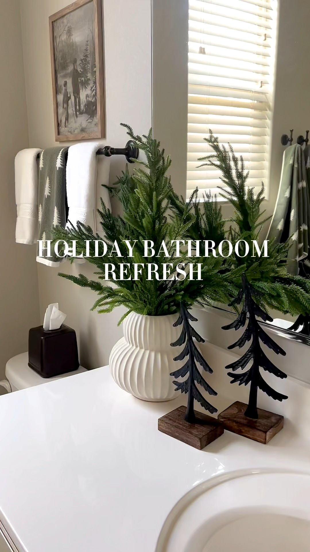 Holiday bathroom refresh!  Follow @lifeinmyarizonahome on Instagram for more holiday ideas and inspiration. 

I absolutely love these reversible tree towels, they give off the perfect winter vibe that can be used all the way until January. 
I love how adding seasonal towels, a few stems, and some inexpensive artwork, can help add to the holiday cheer!
The art is a digital download in the 11x14 size that I had printed at Walgreens. 

Pine Tree Reversible Jacquard Towel | Norfolk stems | digital download art | bench | iron deer | iron trees | Ceramic Sandy Glaze Vase | ceramic houses | canisters 


#LTKSeasonal #LTKHoliday #LTKHome