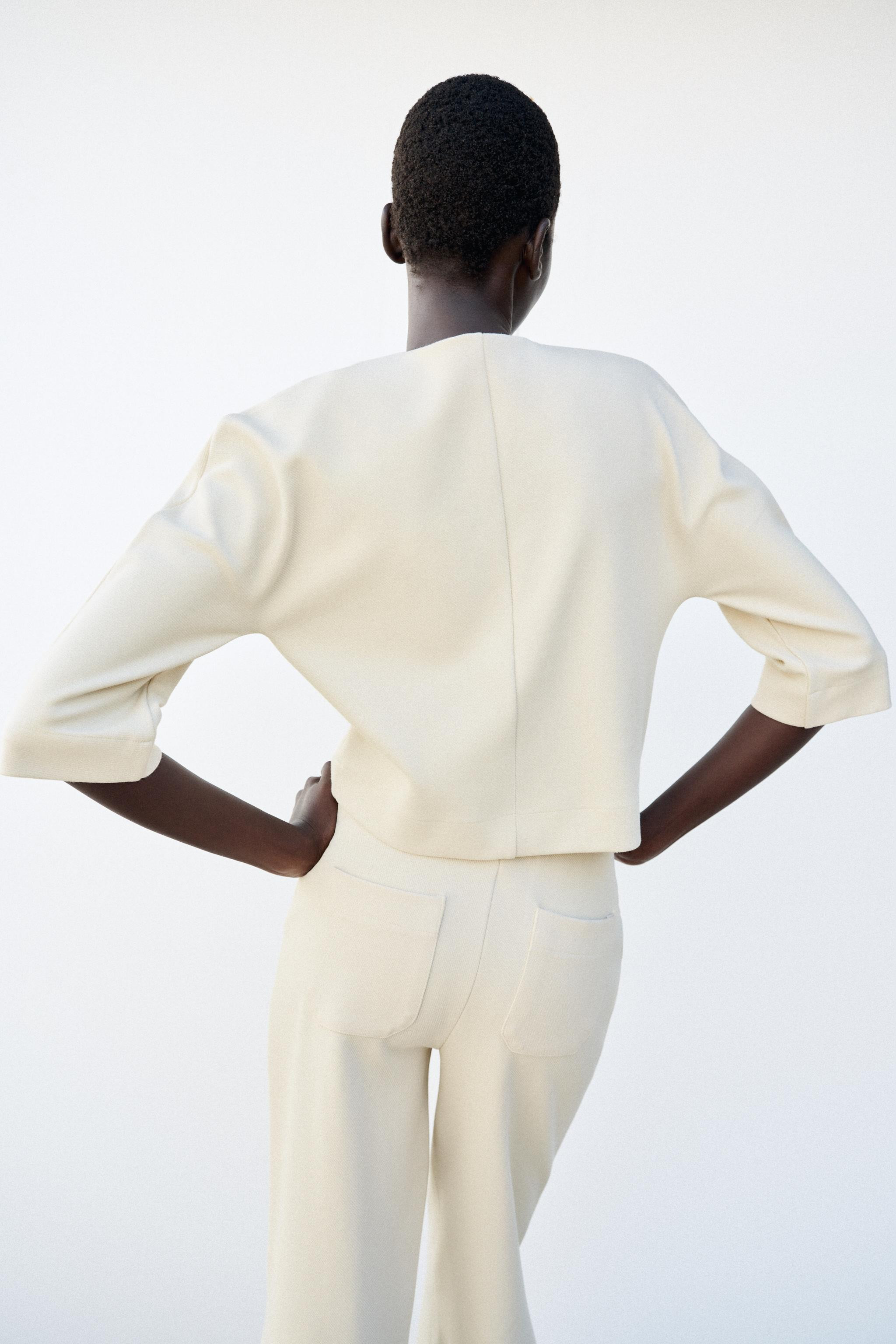 Model height: 178 cmSweatshirt made from a cotton blend. Featuring a round neck, below-the-elbow ... | Zara UK