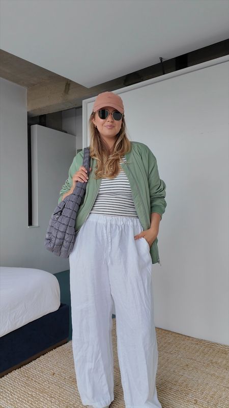 **22/30** midsize spring outfit ideas 🌷

Uniqlo stripe built in bra top vest [XL]

Boden linen white trousers [OOS - dupes tagged]

M&S khaki bomber jacket [UK 18]

Adidas clay cap

Free People quilted bag [Graphite]

Birkenstock bostons taupe [UK 7]

Ray bans unisex via Amazon Fashion

#LTKsummer #LTKeurope #LTKuk
