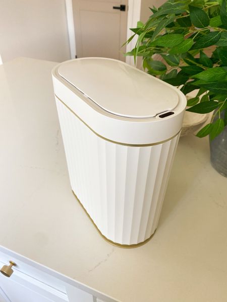 White & gold accent automatic mini trash can 20% off on Amazon! 

#LTKhome #LTKfindsunder50 #LTKstyletip