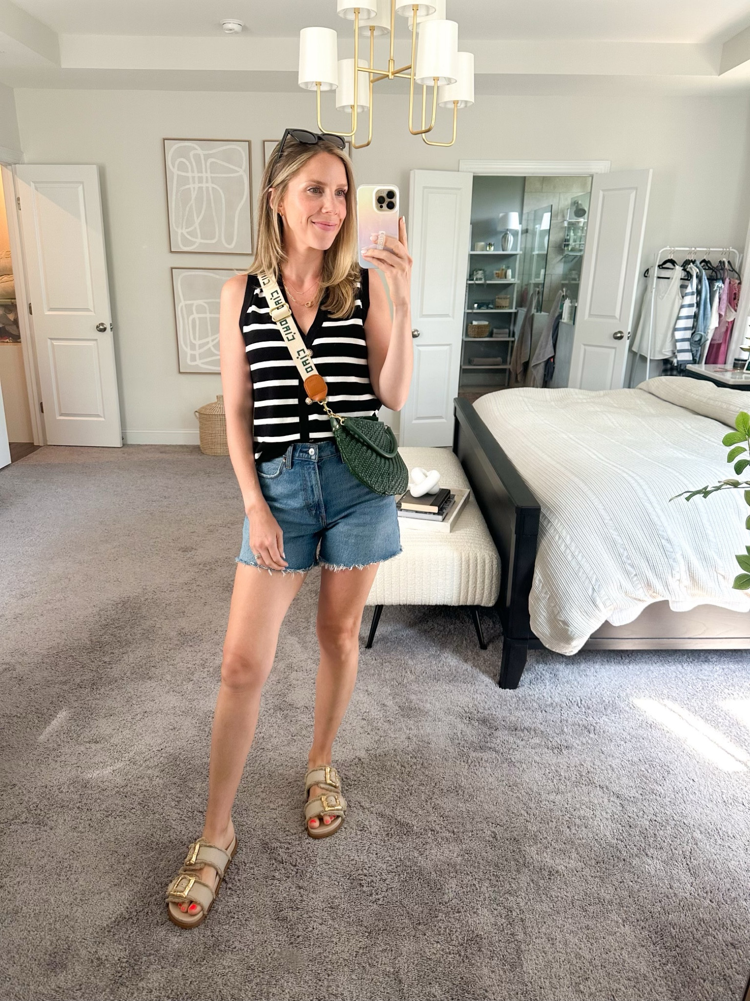 She’s in a sweater vest! And shorts with a button! And makeup! 😝 So many of my days are elevated lounge clothes with minimal makeup and 2nd day hair with the kids (which there’s nothing wrong with!), so it feels good to change it up sometimes. This sweater is a recent Amazon find that is 💯 