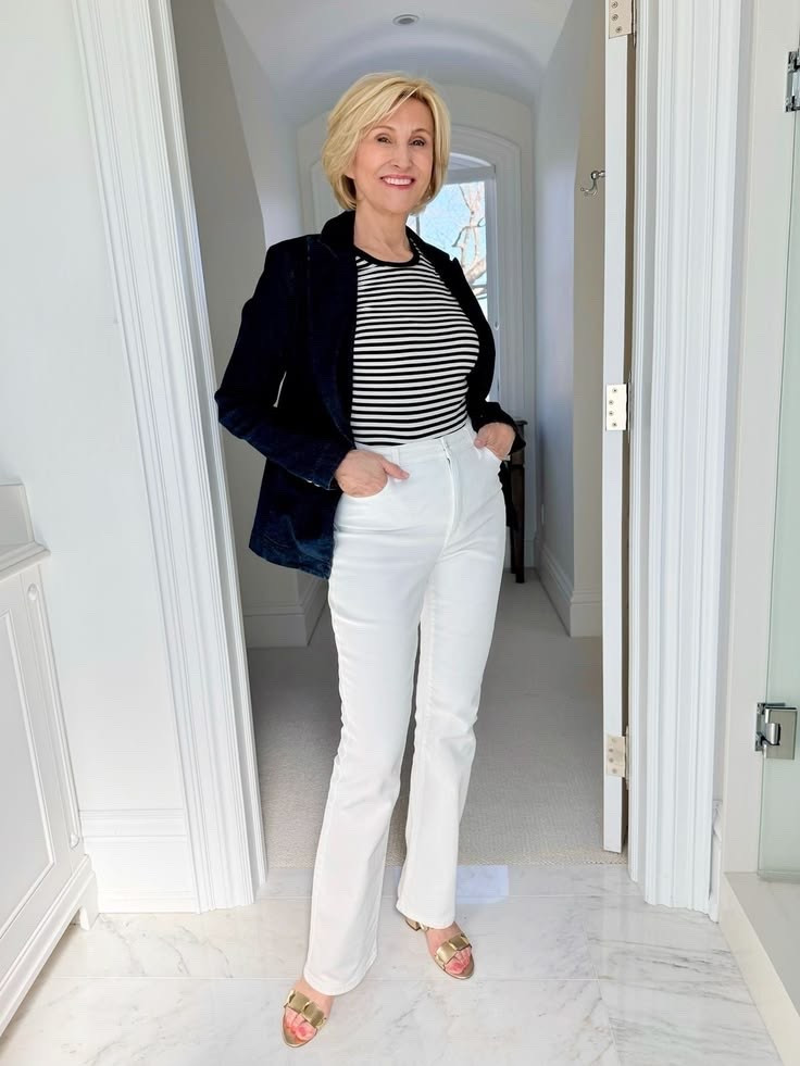 Some outfit combinations never go out of style, and this one is definitely a favorite. 💙 A striped tee layered under a denim blazer, paired with crisp white jeans and gold block heels—it’s the perfect mix of casual and polished.

I love outfits that make me feel put together without feeling overdressed, and this look checks all the boxes. Comfortable enough for everyday wear but polished enough for lunch with friends, a meeting, or date night.

#LTKOver40 #LTKSeasonal #LTKootd