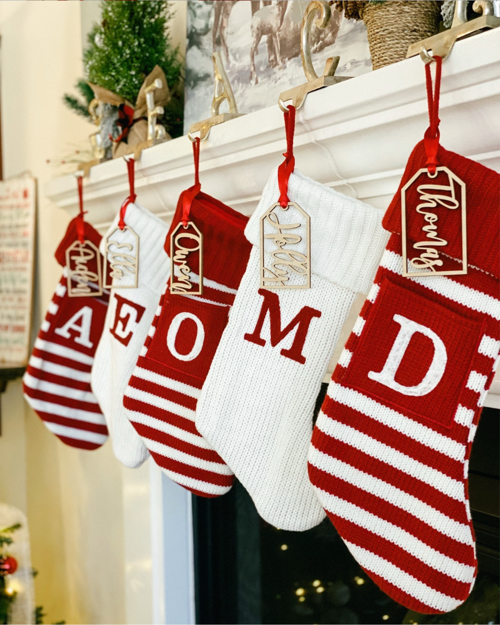 Christmas stockings! And, our favorite personalized handmade wooden ornaments that we use as name tags! They are on a major sale over 50% off! They make great gifts! You can use them as tags on gifts or around wine, bottles, or as bag tags!#LTKunder50



#LTKHoliday #LTKGiftGuide #LTKSeasonal