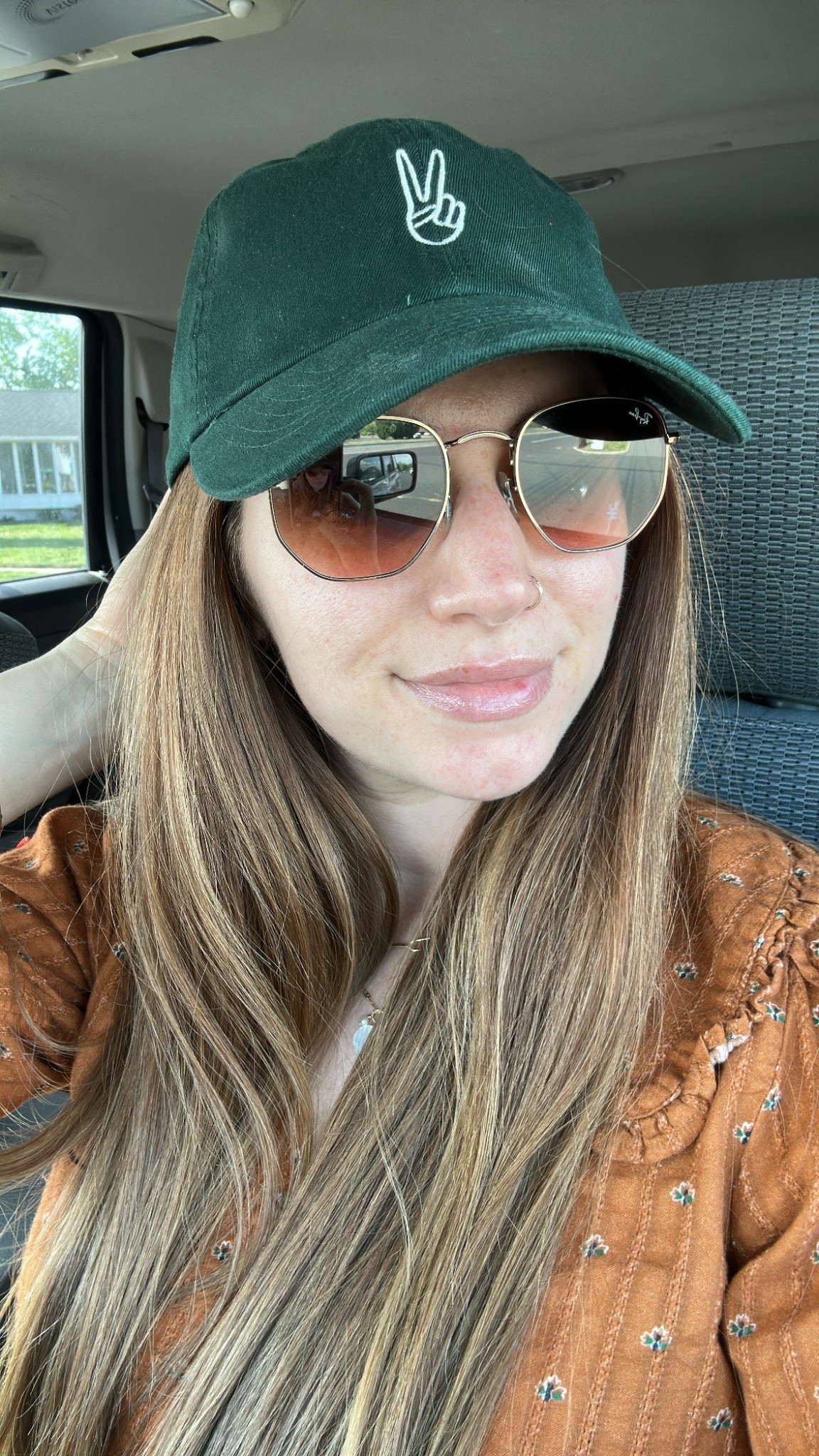 Natalie borton green peace ✌🏻 hat, my go-to sunflasses and this cute blouse from Anthro! 
Couldn’t find this exact colorway but found some very cute other ones available 😍, and great for spring!
✨Get 20% off Anthro online from 5/8-5/11✨

#LTKSaleAlert #LTKSeasonal