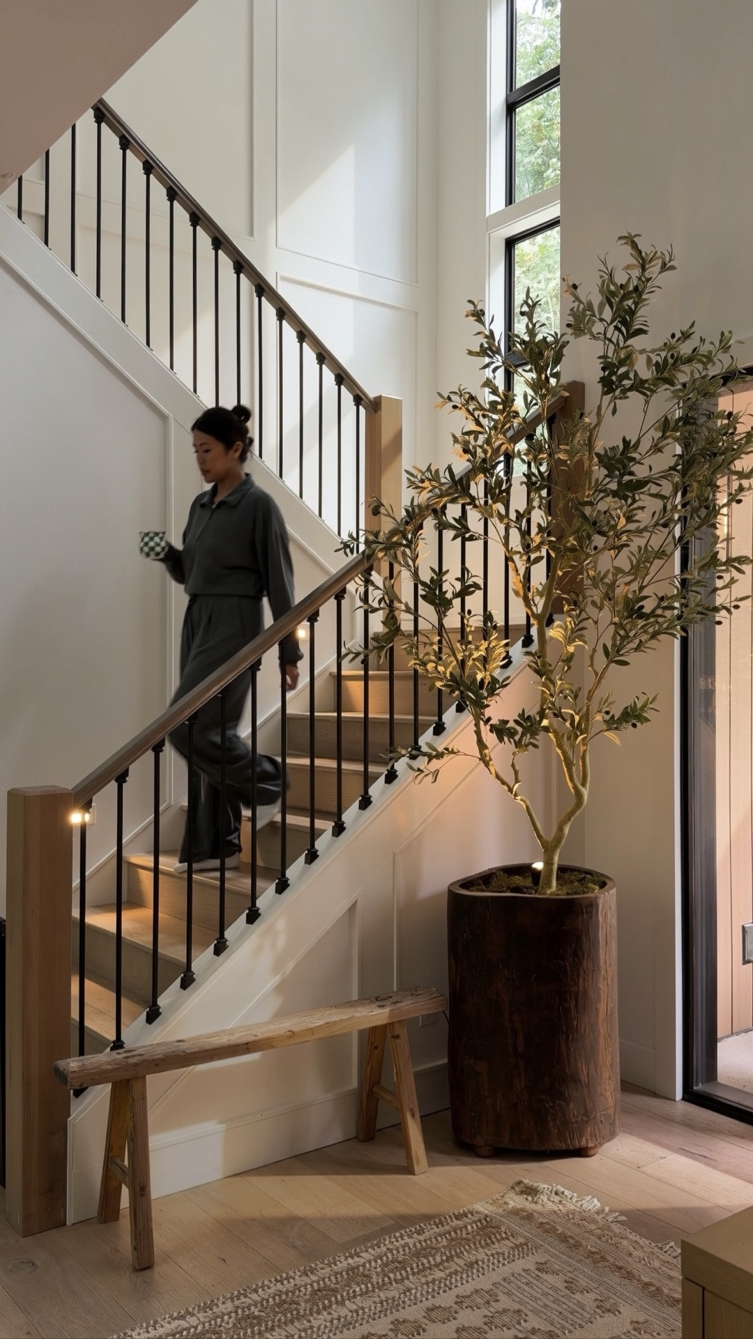 I added this oversized 8’ faux olive tree & plug-in spot lights to this empty corner and it instantly made the whole space feel warmer and elevated! ✨

#LTKHome #LTKSaleAlert