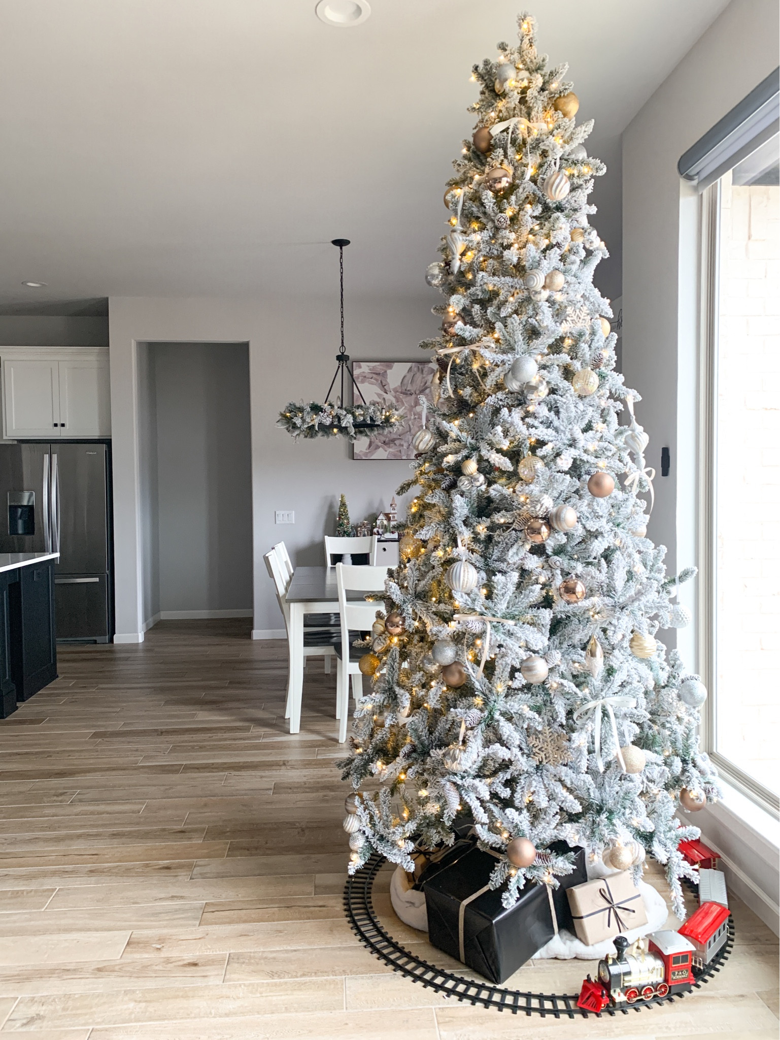 Christmas views with our new flocked tree/garland and ornaments! It’s our favorite tree so far.

Home decor, Christmas decor, holiday decor, Christmas living room, flocked tree, train under tree, gift wrap, Christmas village, Christmas home

#LTKHoliday #LTKSeasonal #LTKhome