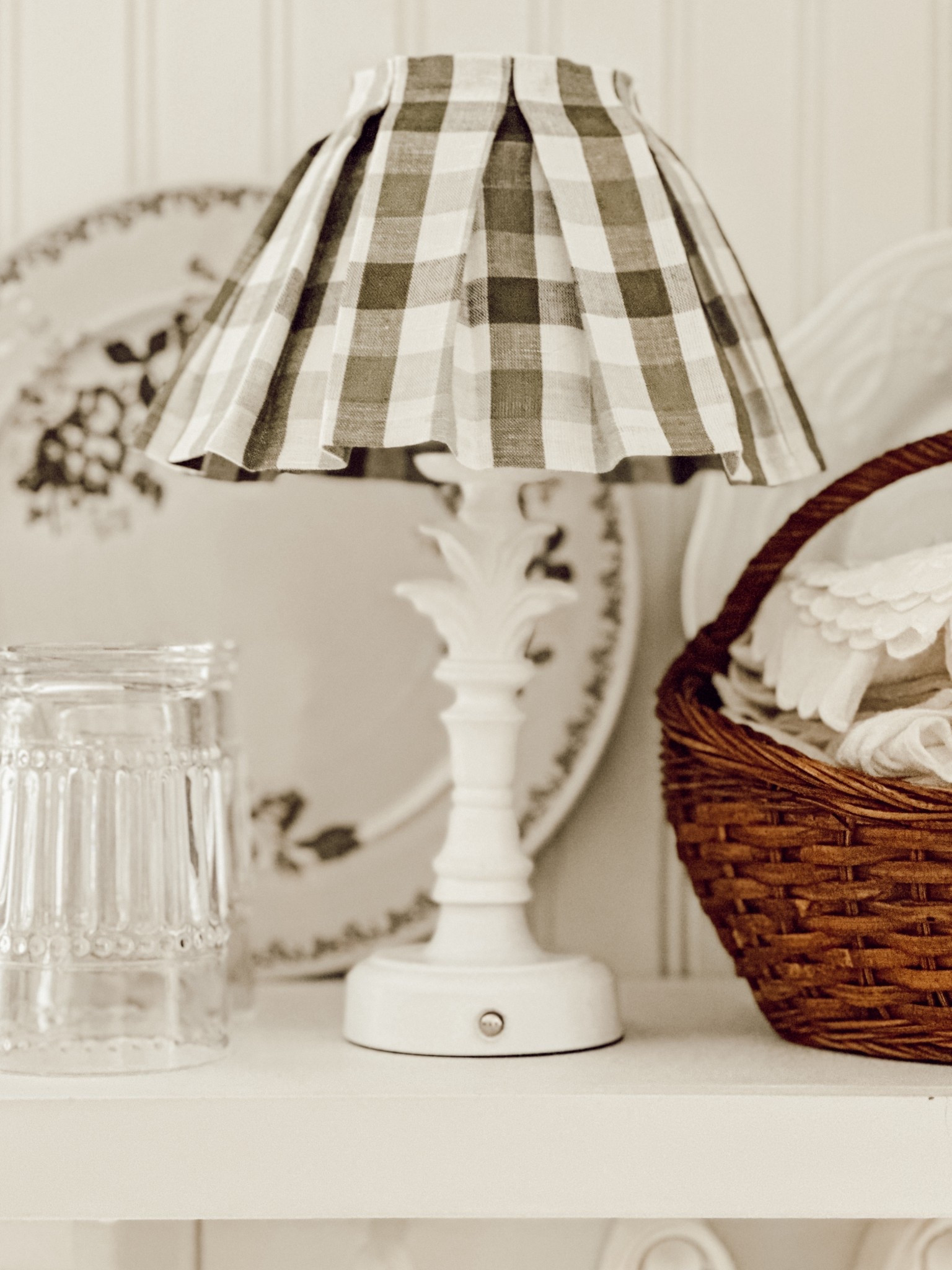 I made my own cozy lampshade cover with leftover curtain fabric. All you need to make your own is fabric, scissors, and hot glue. The full tutorial is on the blog!

#LTKHome