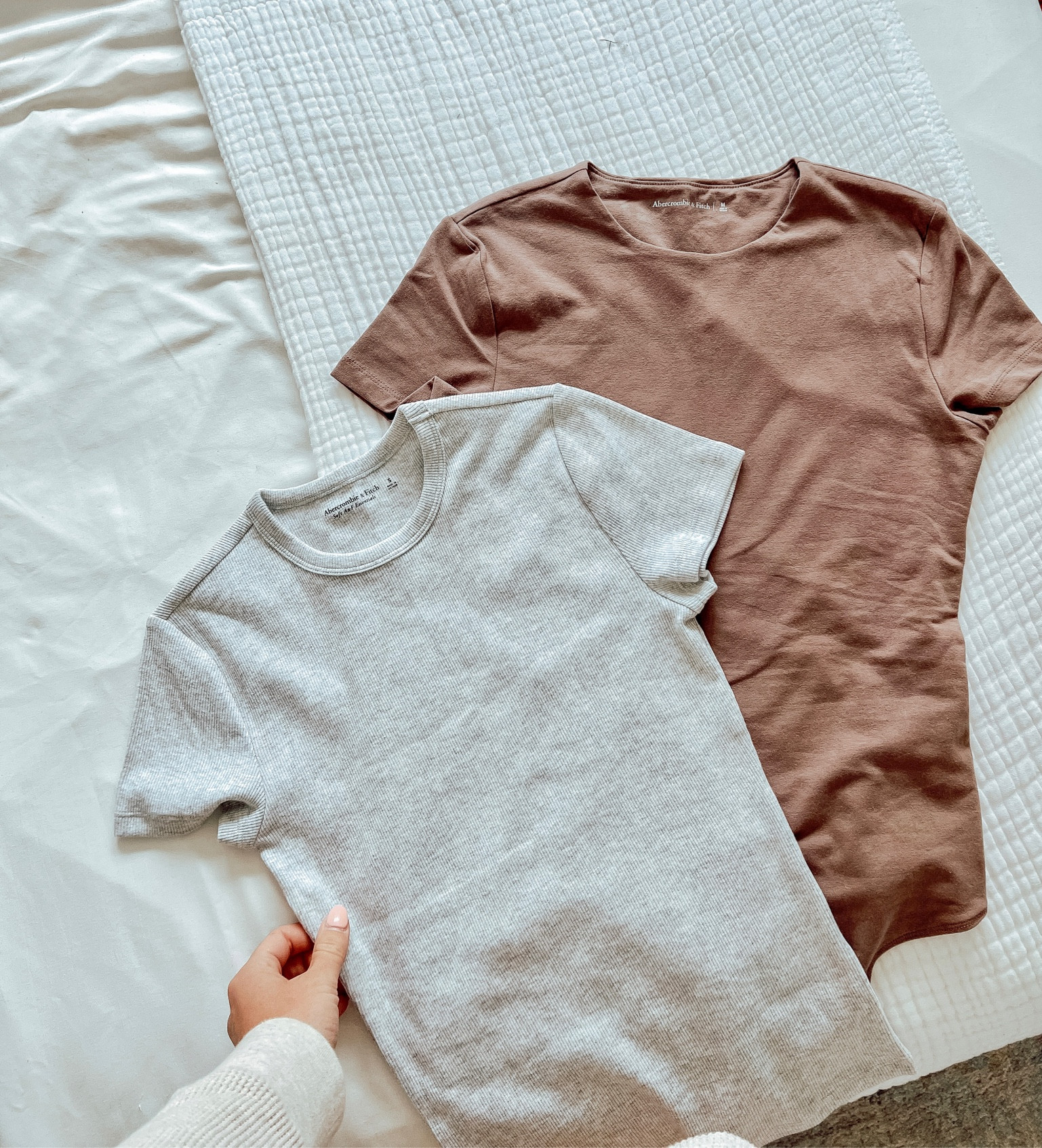 The perfect summer t-shirts! 
Abercrombie tuckable rib tshirt - S
Abercrombie cotton body suit - M