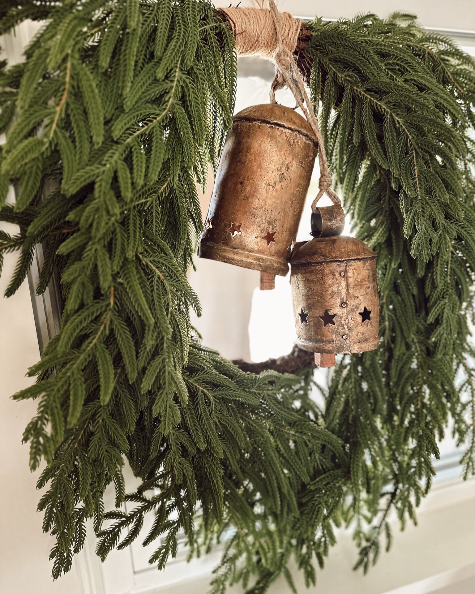 In love with this wreath and bells from a local shop! 

#LTKHoliday #LTKhome #LTKSeasonal