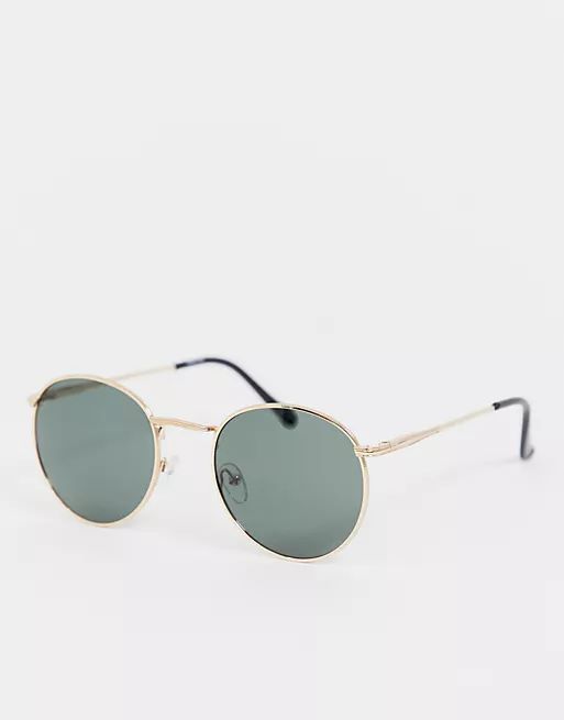 ASOS DESIGN round metal sunglasses in gold with nose bridge detail | ASOS (Global)