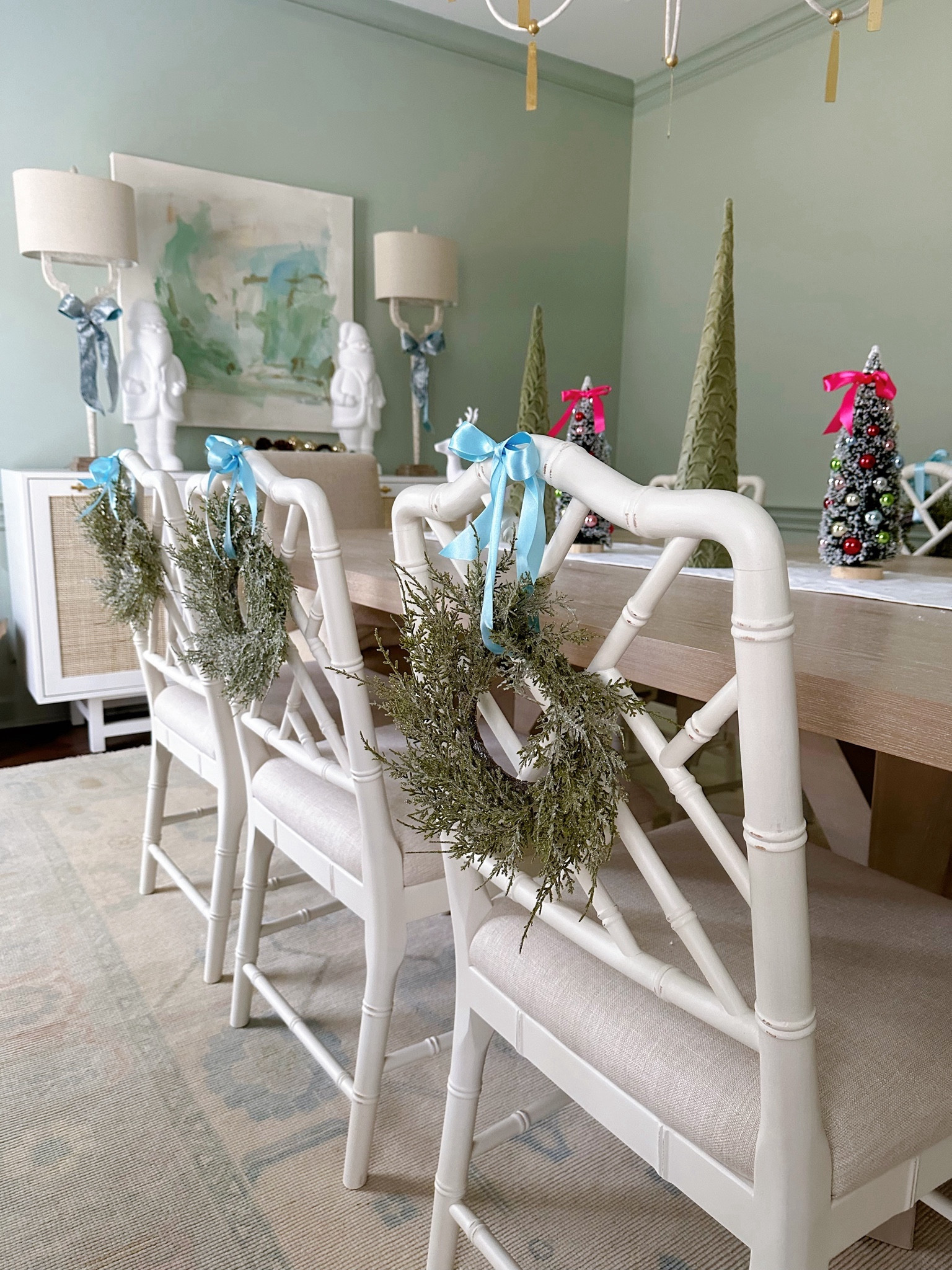 Mini wreath with ribbon on the back of a dining room chair is just the sweetest holiday touch in my opinion 🥹 my chairs are on sale for Black Friday 🏃🏻‍♀️🏃🏻‍♀️🏃🏻‍♀️

#LTKsalealert #LTKHoliday #LTKSeasonal