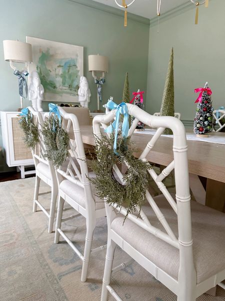 Mini wreath with ribbon on the back of a dining room chair is just the sweetest holiday touch in my opinion 🥹 my chairs are on sale for Black Friday 🏃🏻‍♀️🏃🏻‍♀️🏃🏻‍♀️

#LTKsalealert #LTKHoliday #LTKSeasonal