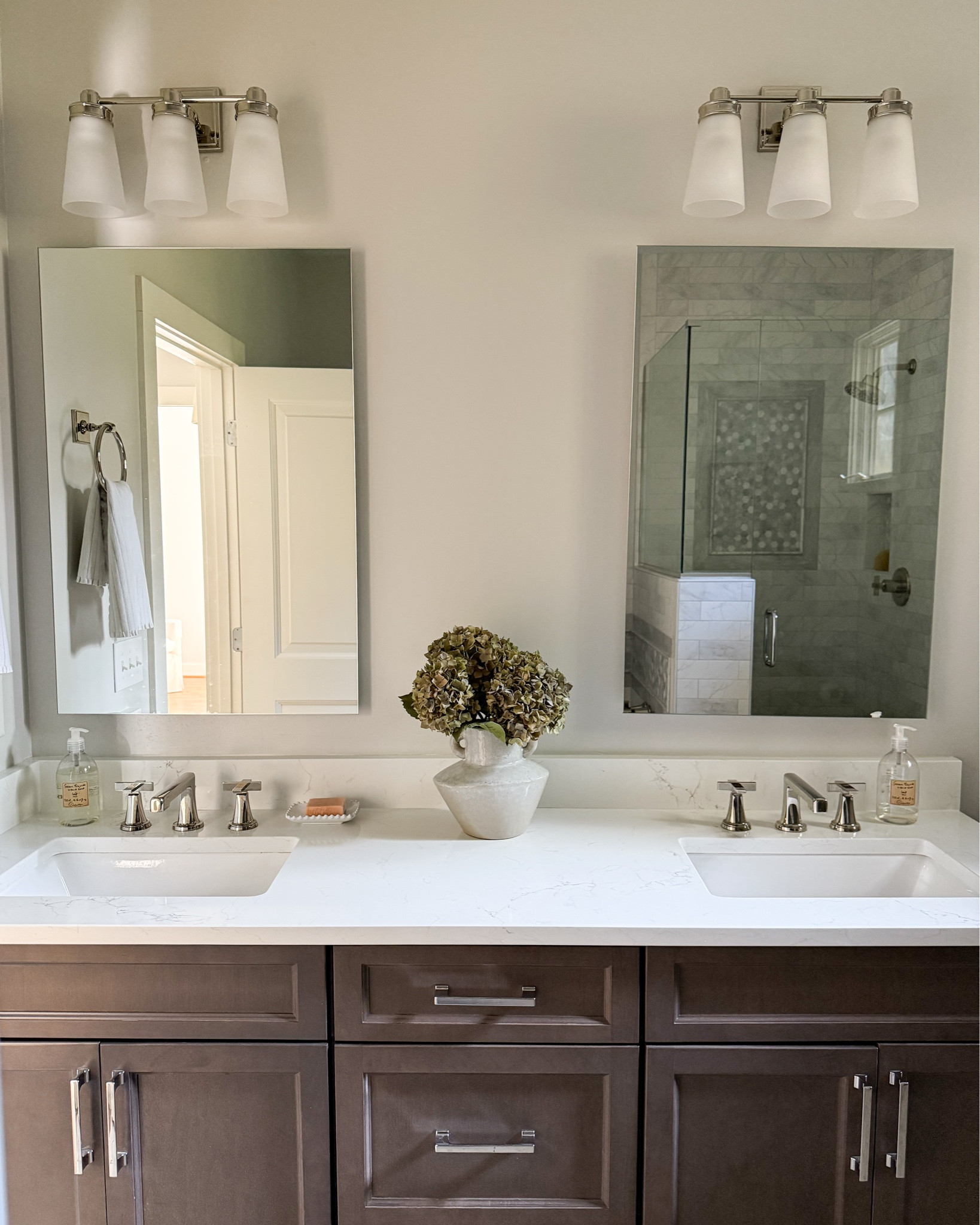 Primary bathroom, primary bathroom decor, bathroom vanity lights, soap dish, pretty hand soap, nickel bathroom accessories spa bathroomm