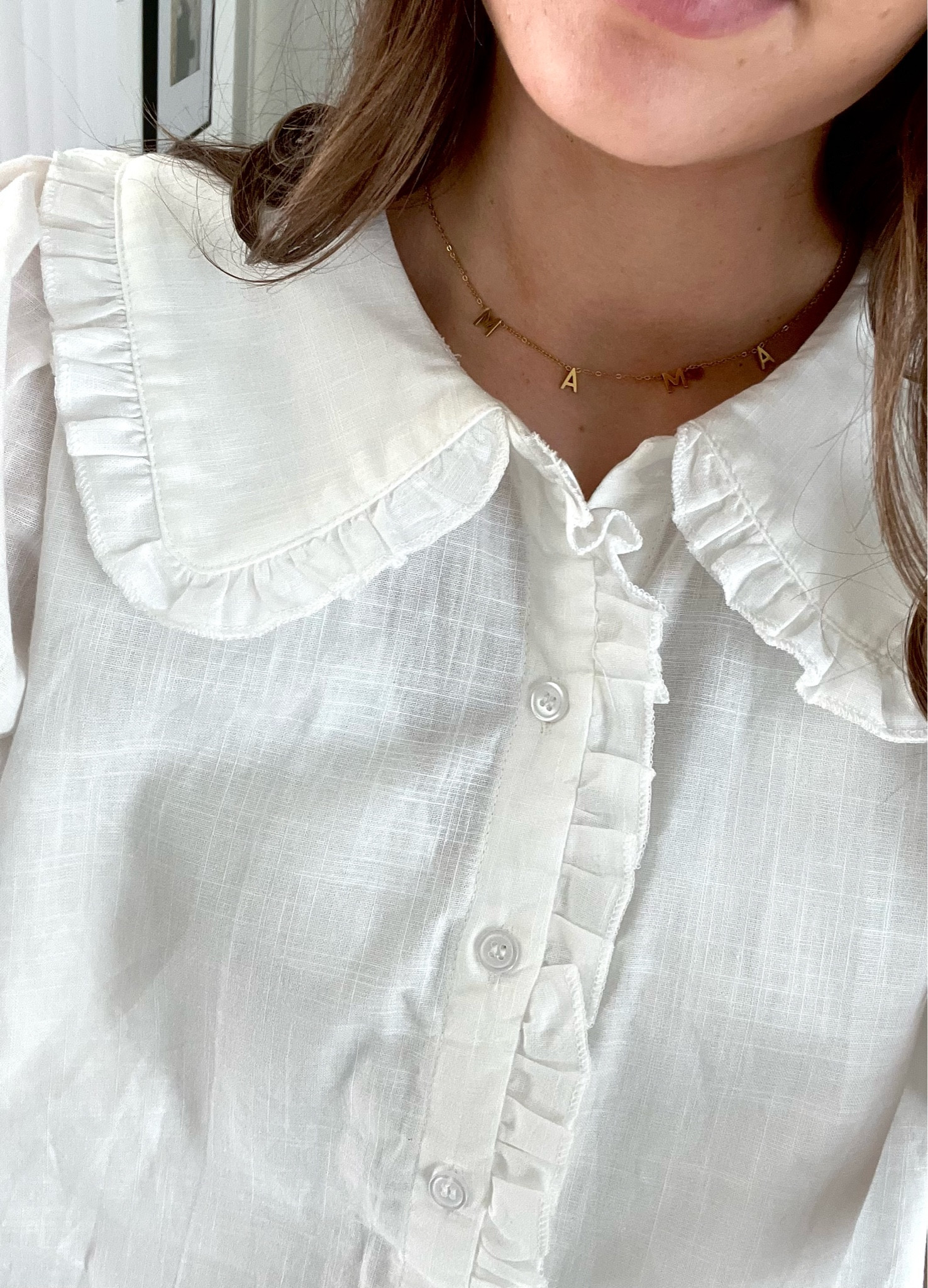 White frilled blouse