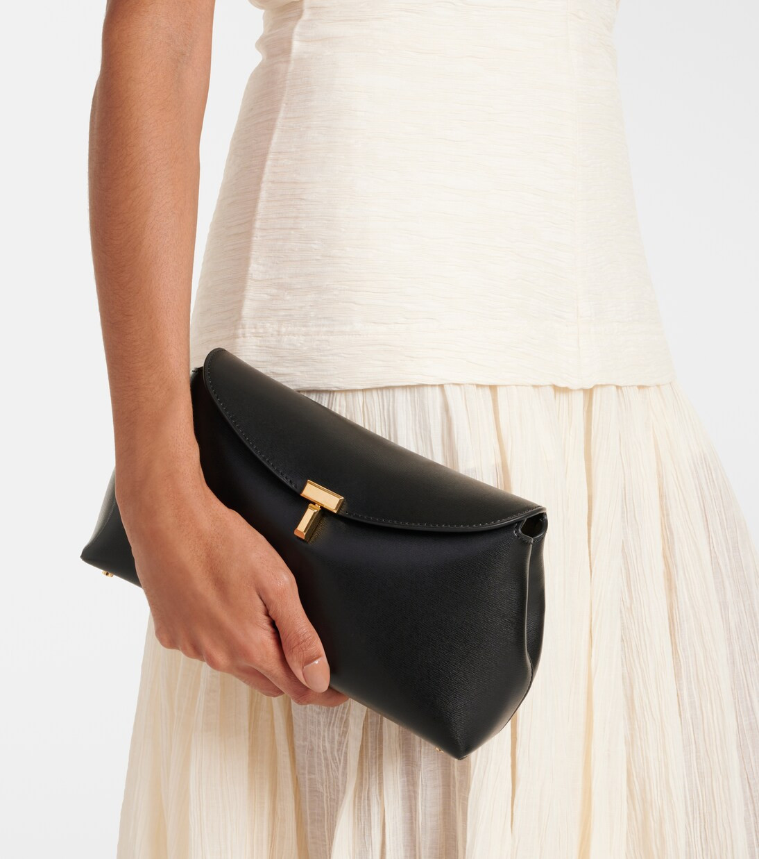 T-Lock Small leather clutch | Mytheresa (US/CA)