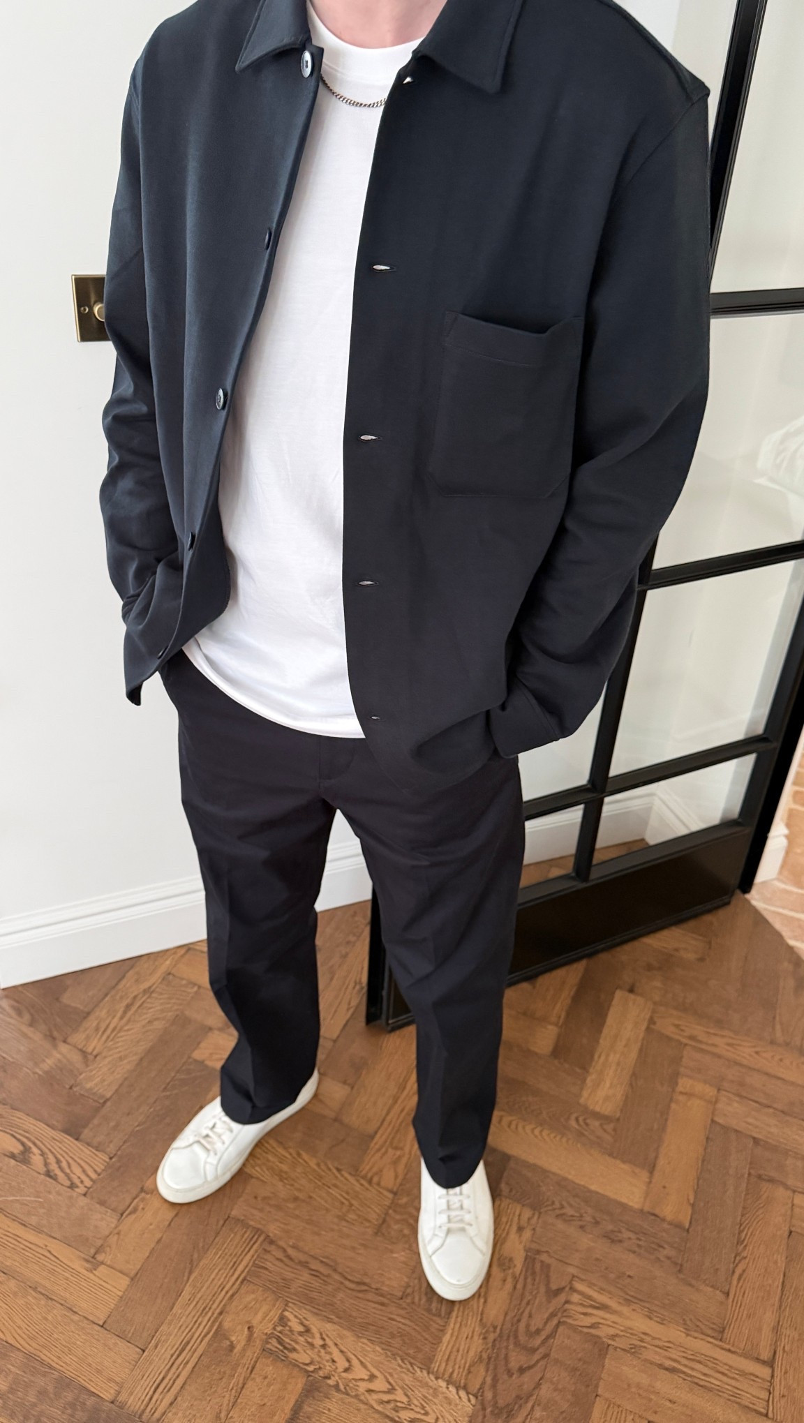 Men’s styling - navy trousers, white t-shirt, over shirt, white trainers, men’s chain, Arket | Men’s outfit 

#LTKstyletip #LTKmens #LTKuk