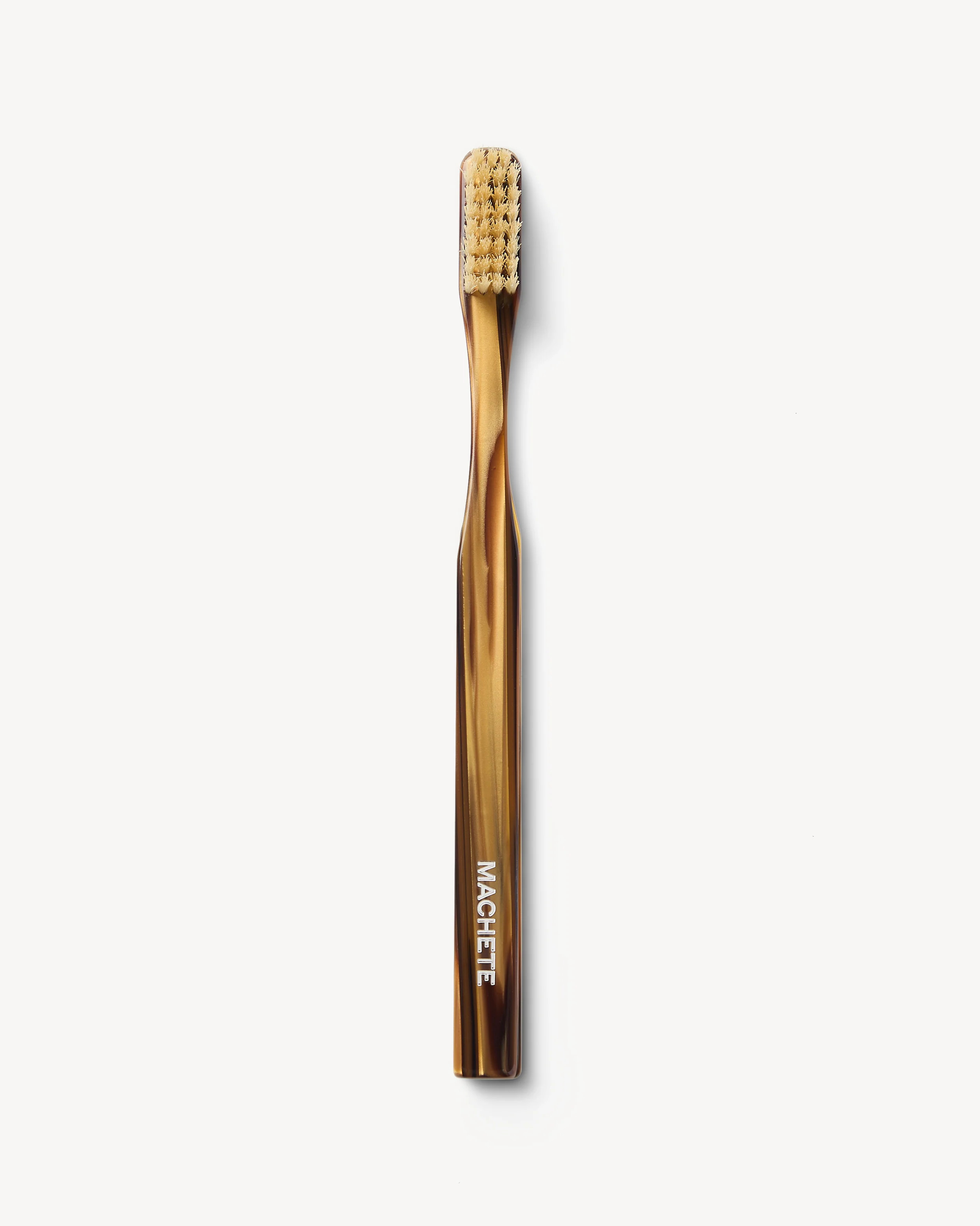 Toothbrush in Tiger's Eye | Machete