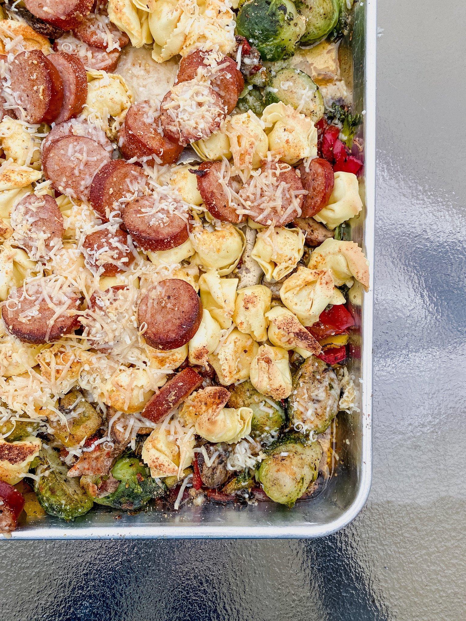 This tortellini sheetpan dinner was so good. PLUS you all loved the sweater I was wearing! Size down in the sweater  