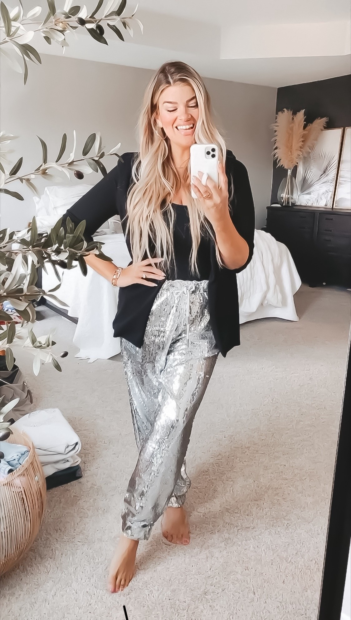 Silver sequin joggers and pants are so festive for the holidays! Perfect for an office work party or gathering at home or out with the girls! Pair with heels or booties