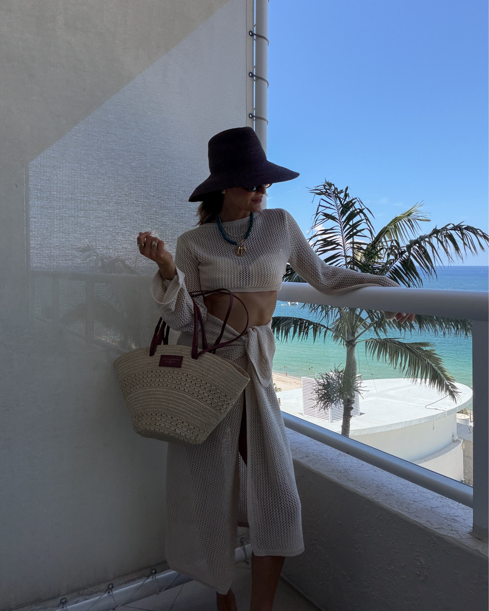 Beach outfit 
O/s knit set
Sezane bag
Montce. Suit small