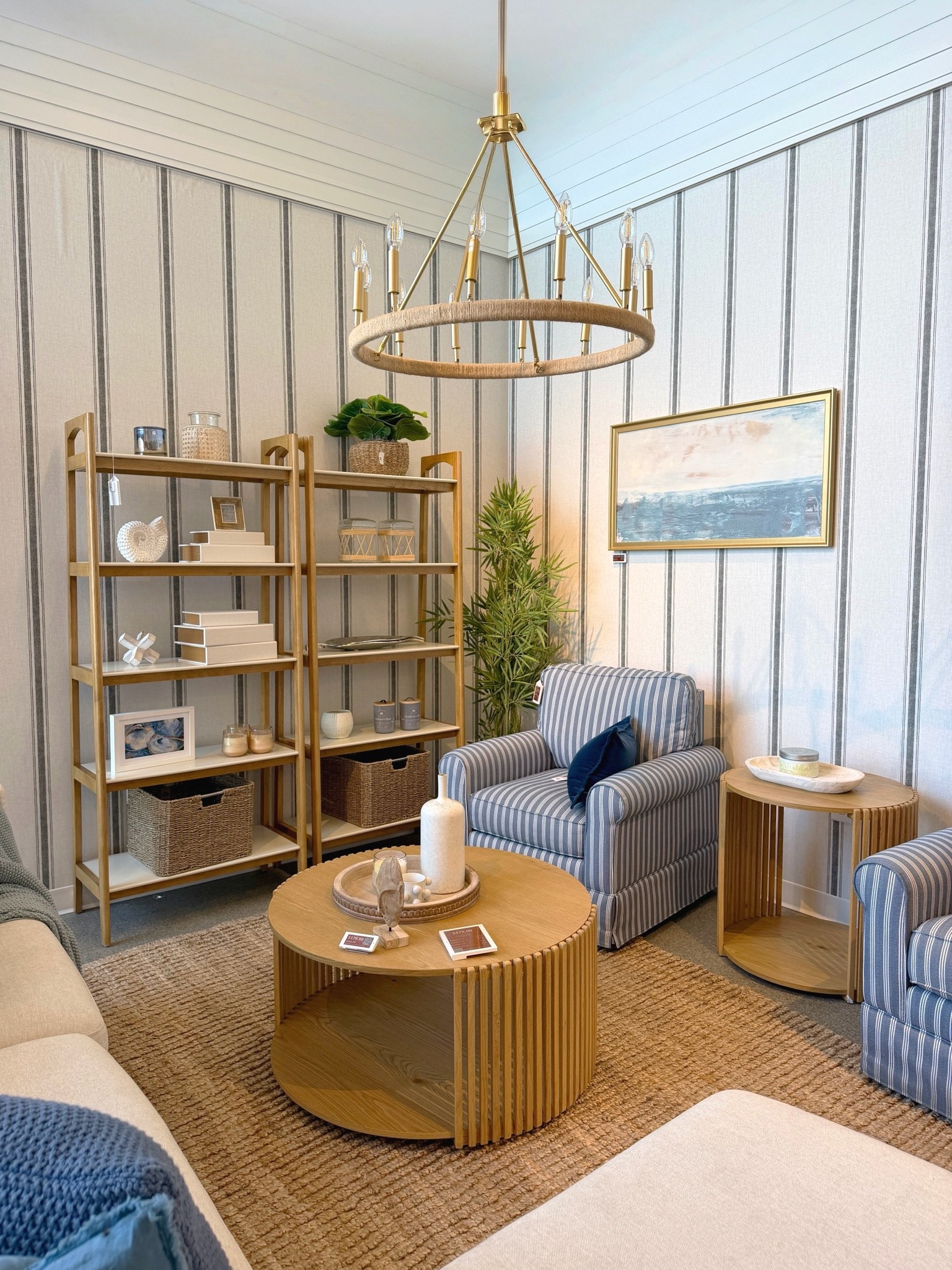 Coastal cottage living room inspiration! 🐚 I love the mix of traditional neutrals, blue accents, nautical details, and vintage-inspired touches throughout this Wayfair space. 😍 The highly rated Kandyn Swivel Accent Chair in Blue Striped Performance Linen is currently on sale and looks so charming paired with the Parker 5-Shelf Ladder Bookcase and striped wallpaper. 🌊⚓️✨ Such a beautiful way to create that collected coastal look! I’ve linked the entire look in my LTK! @Wayfair #coastaldecor #livingroominspo #coastalstyle

#LTKHome #LTKSaleAlert