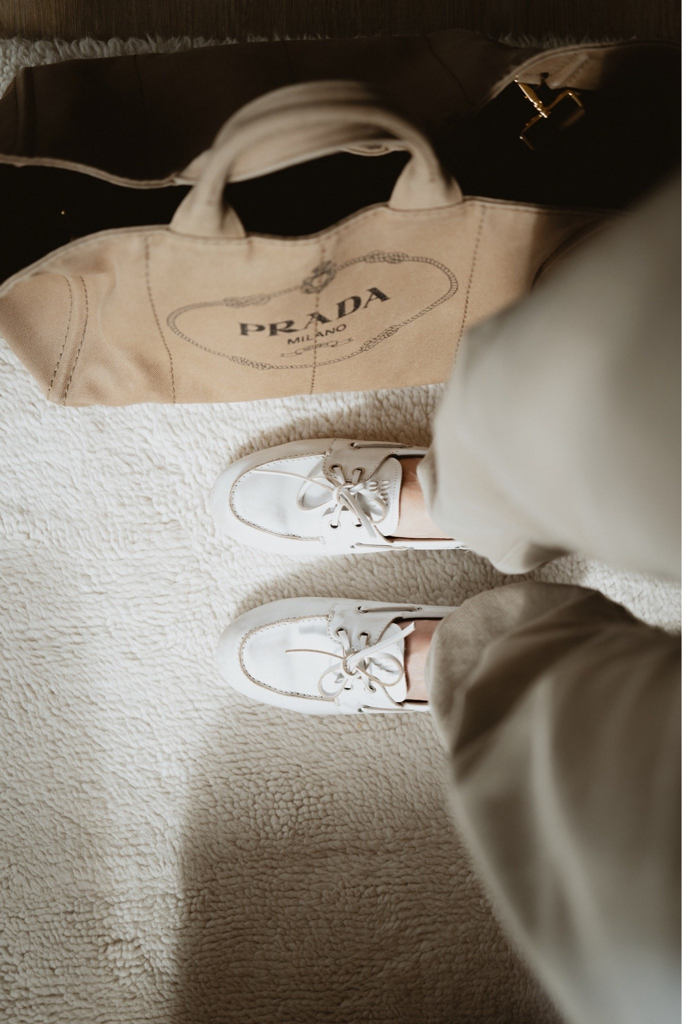 Sweatpants + canvas tote + boat shoes 
Bag: Prada Canapa
Sweatpants: Buck Mason
Boat shoes: Miu Miu

#LTKTravel #LTKootd #LTKmomlife