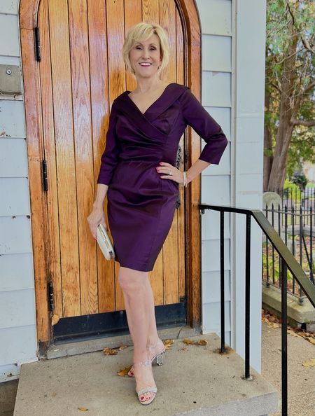 Going to a winter wedding? This purple ruched sheath with the portrait collar neckline makes a great wedding guest dress or mother of the bride or Eve New Year’s Eve dress.