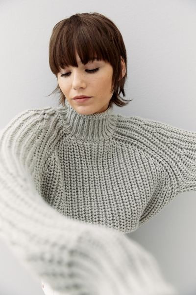 Boxy sweater in soft, knit fabric with wool content. Roll-edge mock turtleneck, long, wide raglan... | H&M (US + CA)
