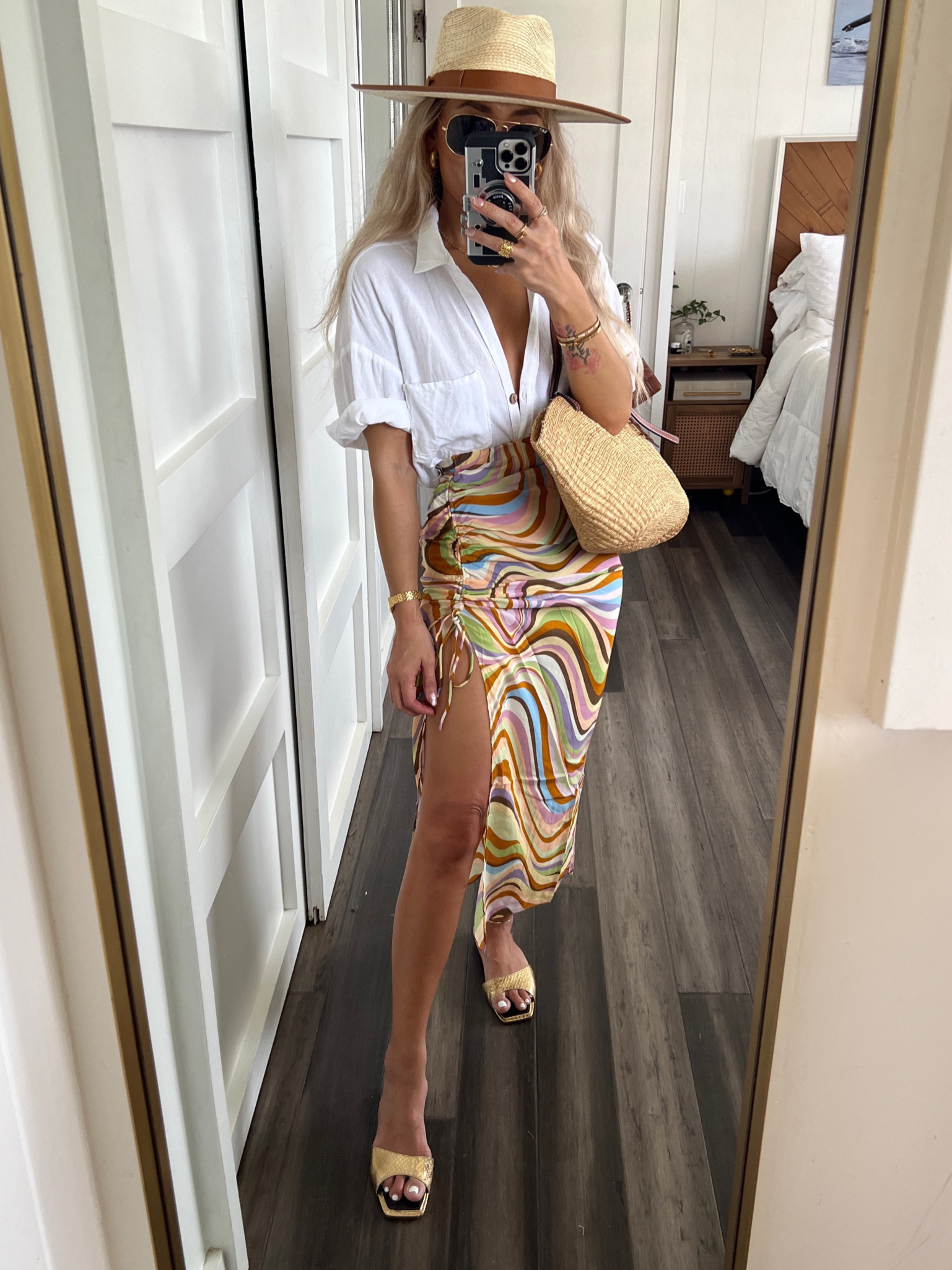 Such a fun skirt! Reminds me of a missoni but just a thousand bucks cheaper! Skirt is more of a coverup 
