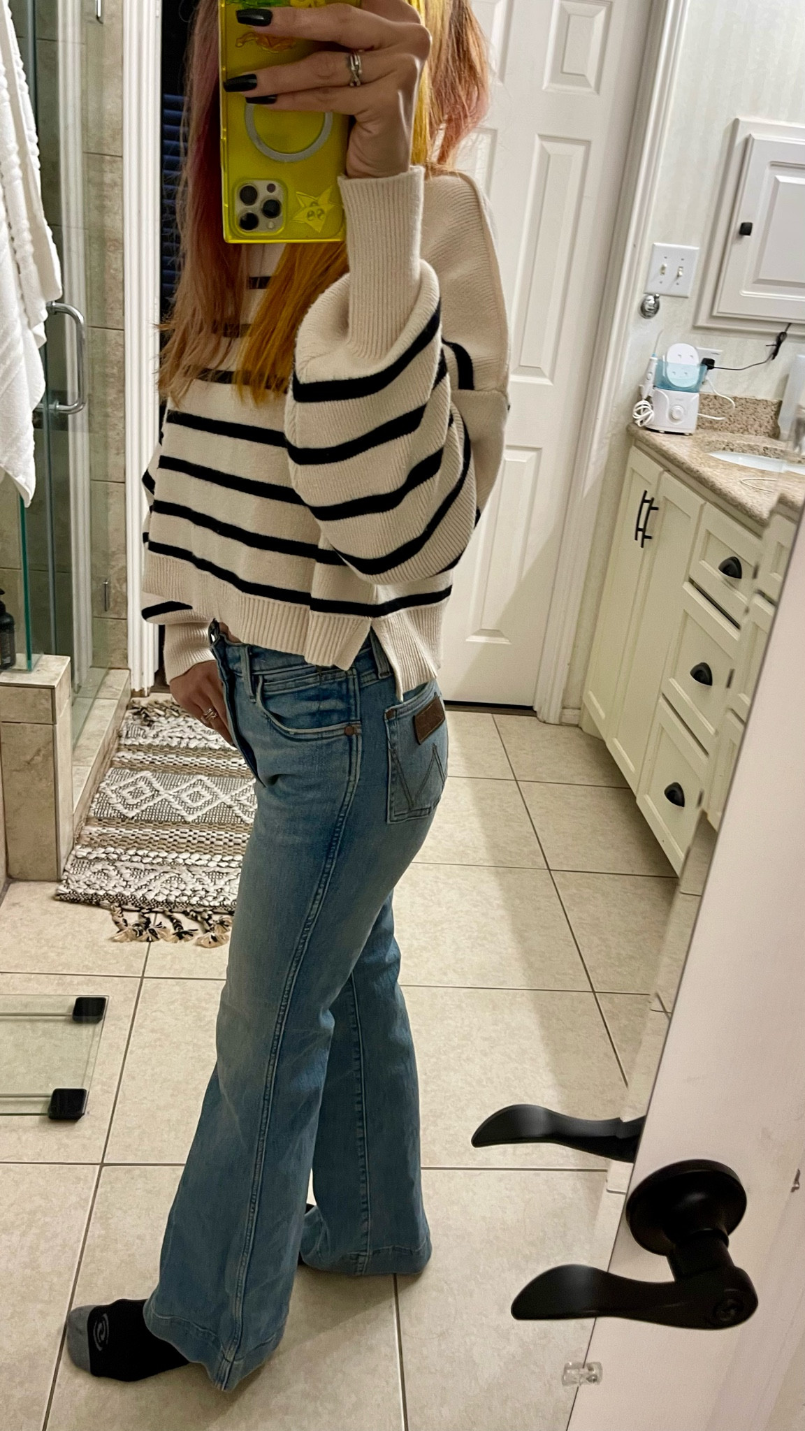 I’ve been living in this striped sweater! It’s so comfy cozy and the “apricot” and black stripe combo goes with so much! I don’t get why it’s called apricot unless they’re referring to the light beige/ivory/warm toned bone color, but anyway, it’s classic with the black stripes. 

The sweater is slightly cropped, but long enough that you aren’t showing midriff with high waisted pants. These retro style flared denim jeans are comfy and classic in their own right. The inseam on these is long enough for my legs and a platform sneaker. This particular wash goes with everything and is currently majorly discounted! 

#LTKfindsunder100 #LTKstyletip #LTKfindsunder50