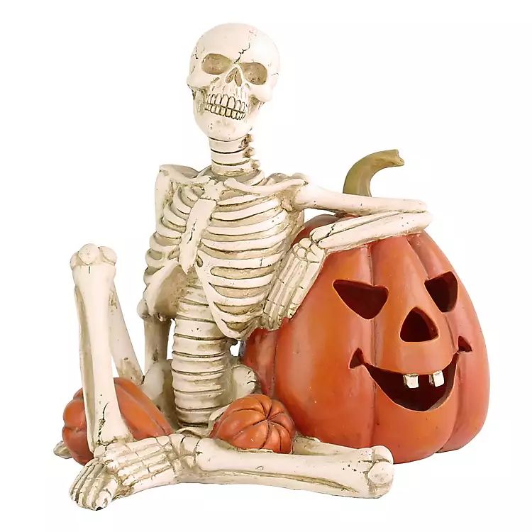 Lighted Skeleton Leaning on Pumpkin Statue | Kirkland's Home