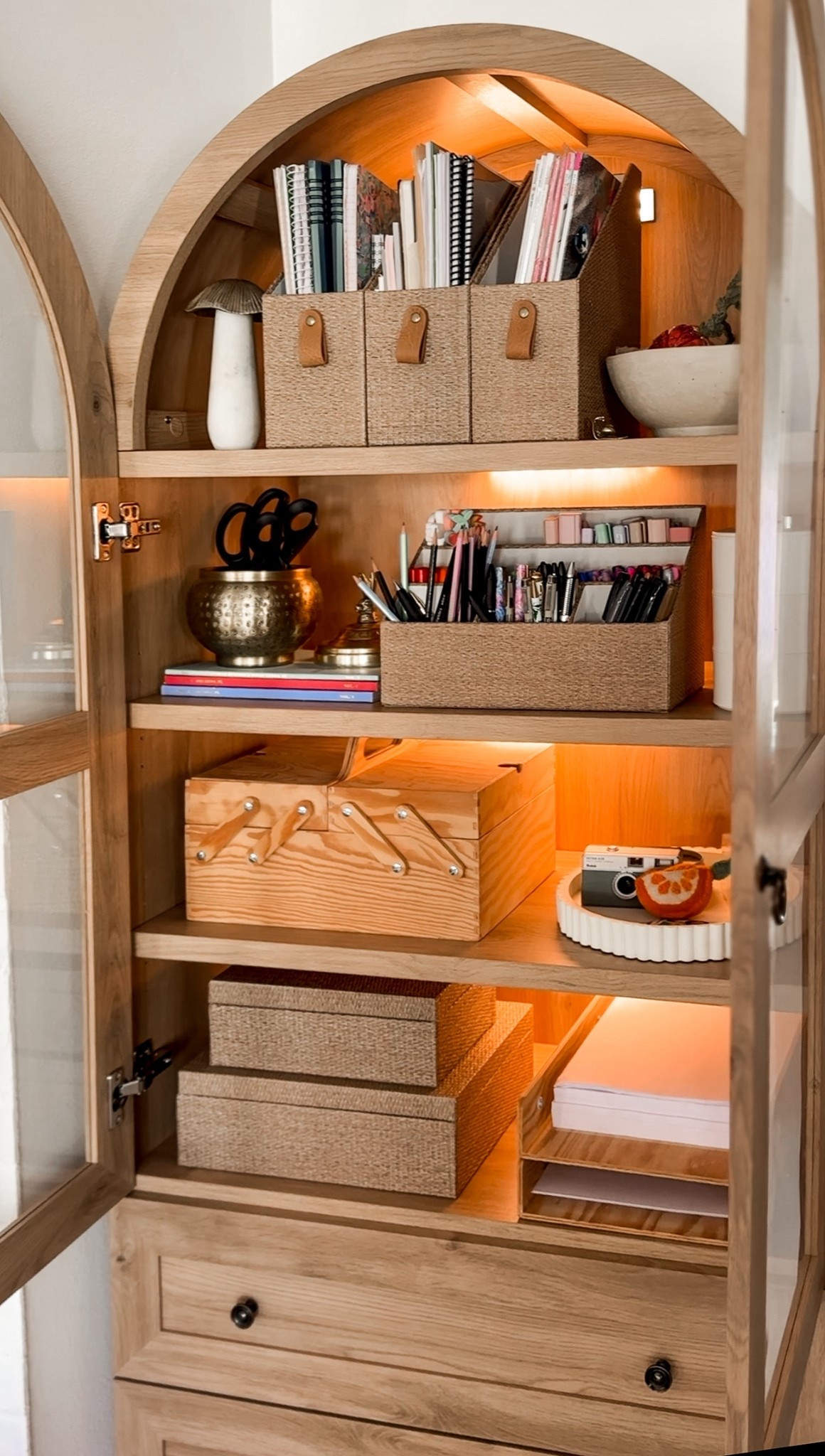 Office organization using an arched cabinet. 