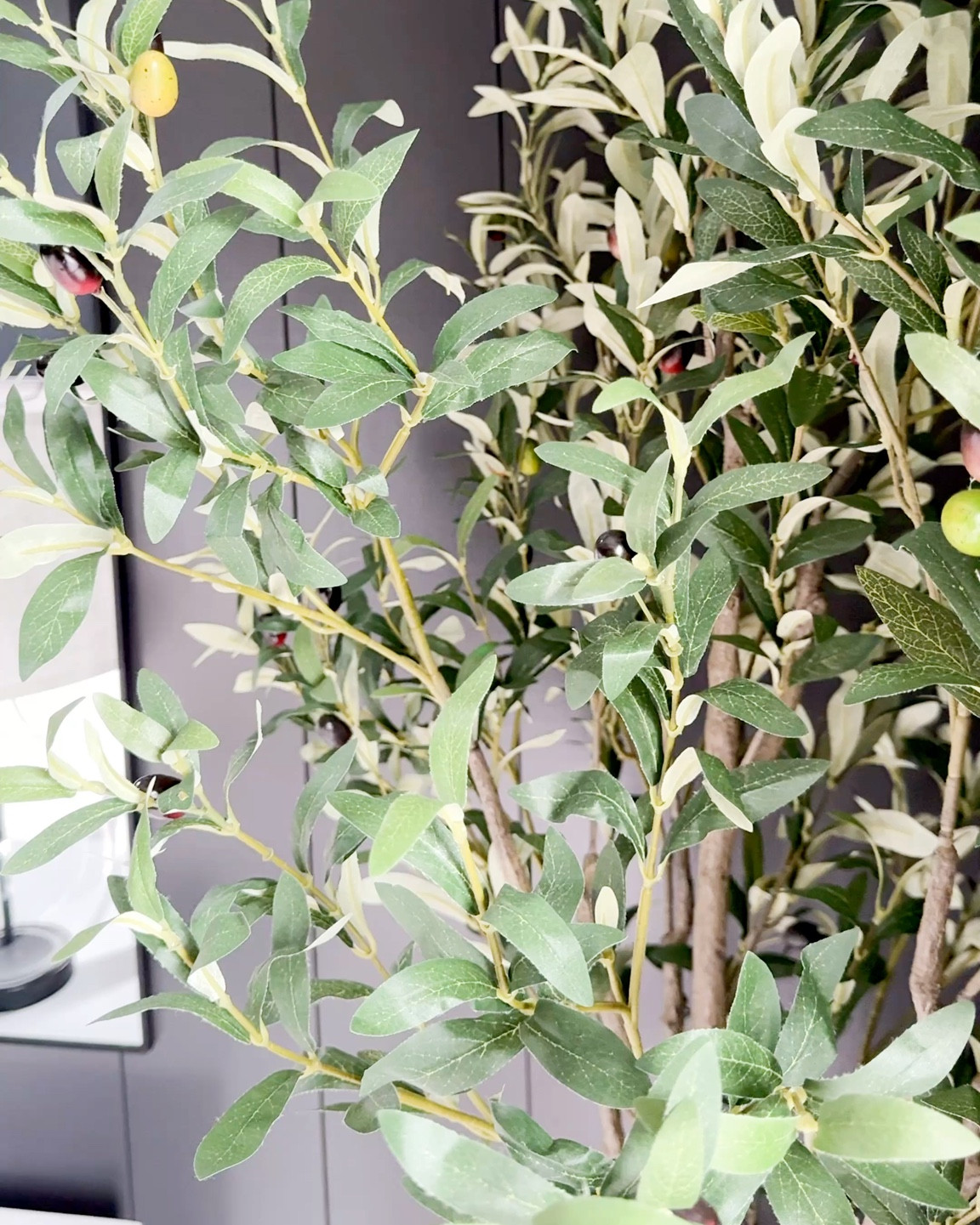 COME ON IN: This faux olive tree will never get old.  I also love the clear glass lamps against the mirrors- the mirrors reflect so much light!!

#LTKHome