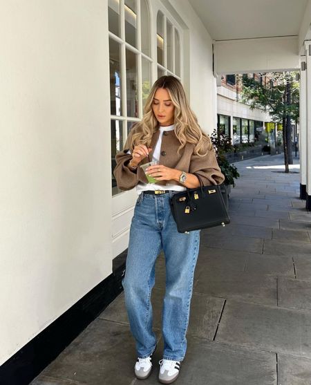Matcha season 💚 Crop beige jacket, neutral outfit styled with white oversized tee and baggy Levi’s blue jeans, featuring the Adidas Sambas and Hermes Birkin 25 black and gold hardware

#LTKSeasonal #LTKitbag #LTKstyletip