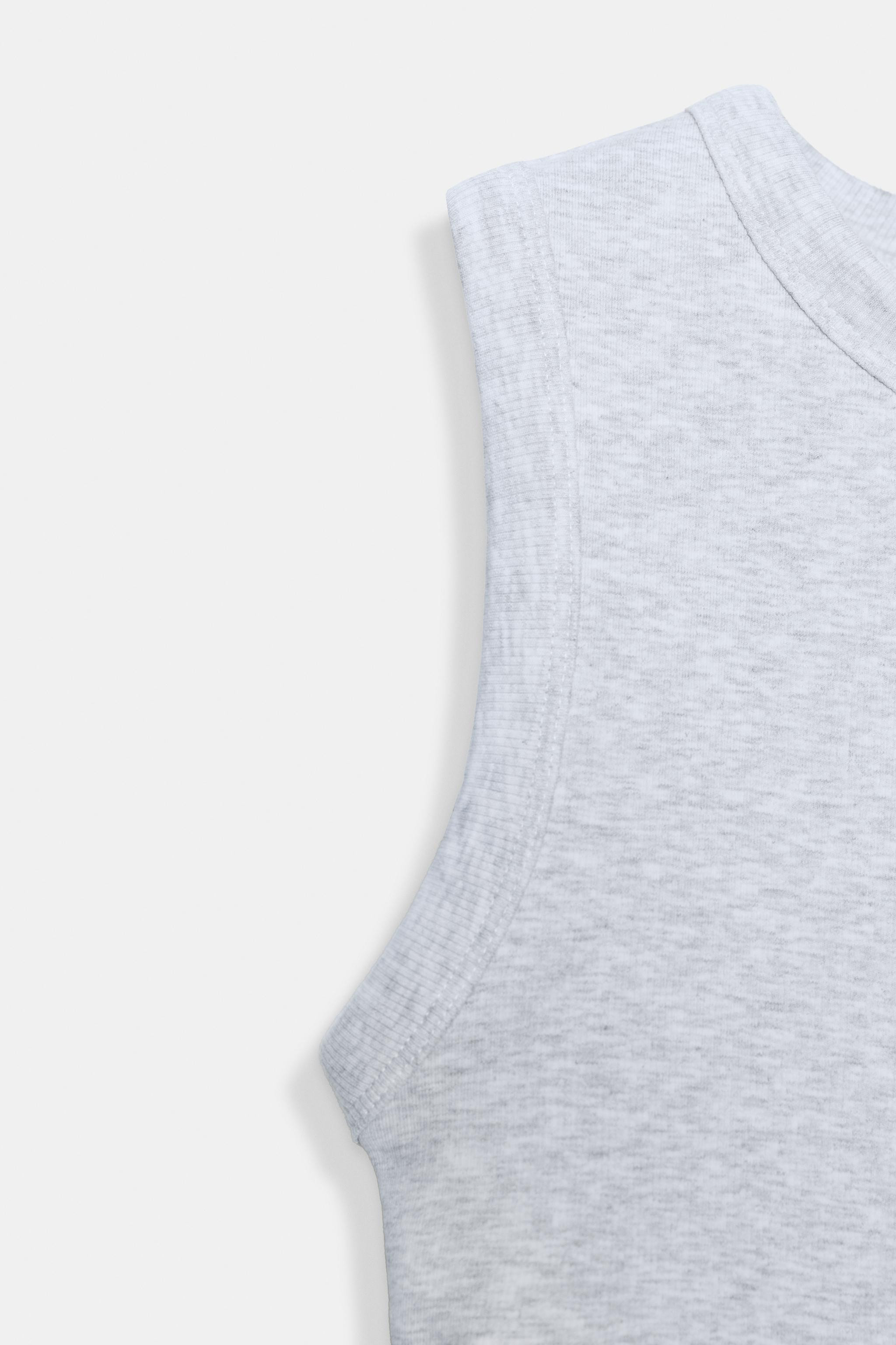 Top made from yarn in a cotton blend. Round neck and straps. Ribbed trims. | Zara UK