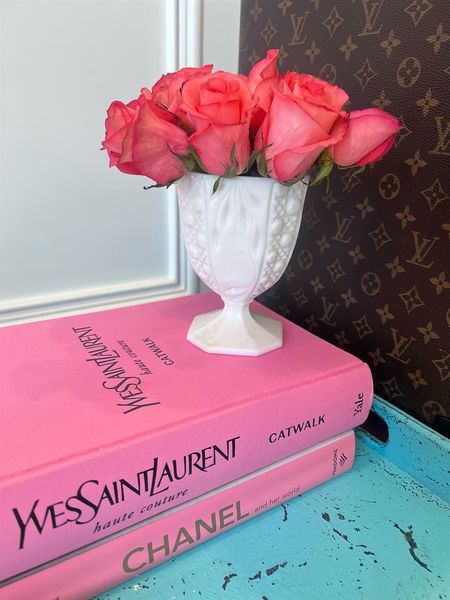 Interior design | coffee table books | milk glass vase | feminine style | pink | home decor 

#LTKstyletip #LTKhome #LTKfamily