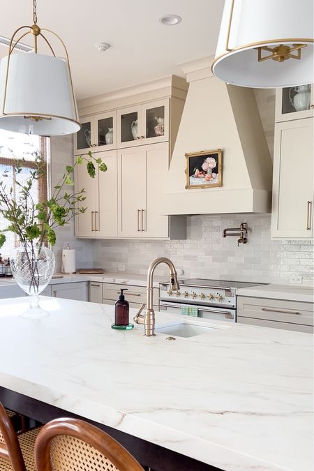 Transitional kitchen with putty colored cabinets and porcelain countertops 

Cabinets: Benjamin Moore Natural
Cream

#LTKhome #LTKstyletip