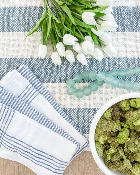 Fun spring decor including woven striped pillows, kitchen towels, my favorite faux tulips, recycled glass beads, and a large ceramic bowl filled with moss.

  spring decorating ideas, coastal decor 

#ltkhome #ltkstyletip #ltkseasonal #ltksalealert #ltkfindsunder100  #ltkfindsunder50

#LTKSeasonal #LTKhome #LTKfindsunder50
