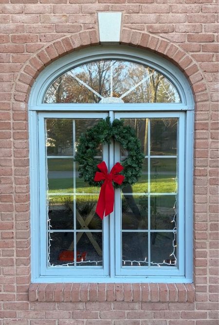 Budget friendly holiday decor! I made this outdoor wreath to hang on my windows for under $8! Quick, easy, budget friendly decor. Christmas.

#LTKHoliday #LTKsalealert #LTKSeasonal
