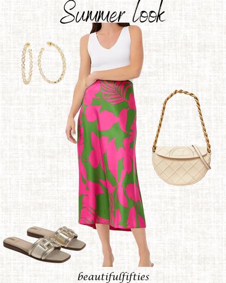 Code THERESAP for 10 percent off jewelry. 

Chic summer look with this colorful skirt and white tank top. Pair with gold strings, metallic sandals and a handbag with a touch of metallic also  

#LTKStyleTip #LTKTravel #LTKParties