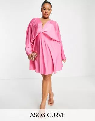 ASOS DESIGN Curve batwing satin mini dress with bias cut skirt and tie back in pink | ASOS (Global)