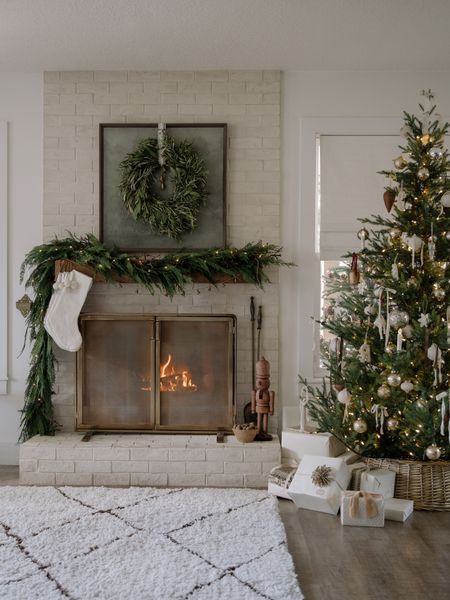 Christmas Mantel with my favorite fireplace screen 

#LTKhome #LTKHoliday #LTKSeasonal