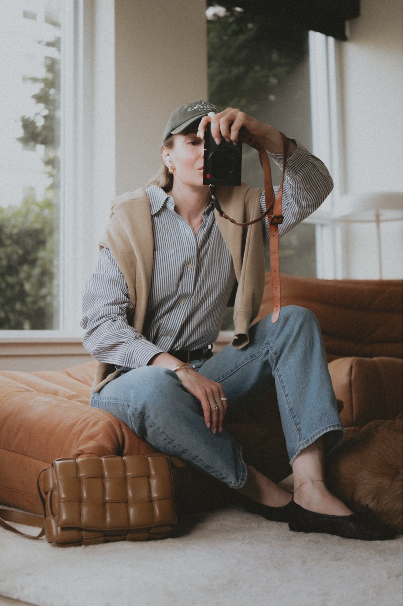 OOTD: @Madewell The Longline straight jeans
+ Frame Ritz baseball cap + Buck Mason striped shirt + Lacoste polo sweatshirt + Massimo Dutti ballet flats + Bottega Veneta padded cassette bag.

#LTKootd #LTKxMadewell #LTKSeasonal