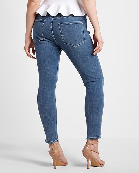 Mid Rise 4-way Hyper Stretch Medium Wash Ripped Skinny Jeans | Express