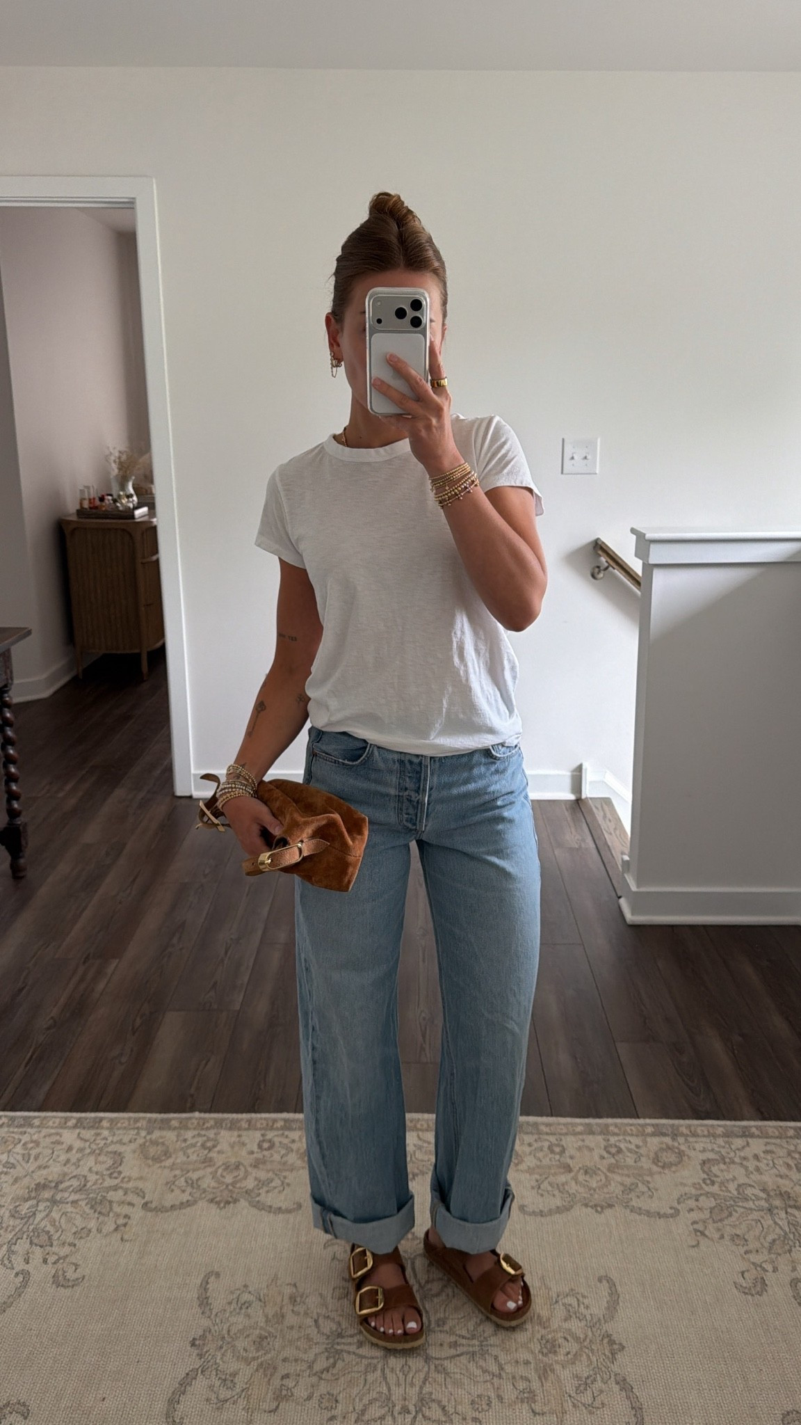 8/18/26 Casual Outfit of the Day 🤎

An easy everyday outfit made up of some of my favorite wardrobe staples. 🤍 Wearing my Rag & Bone white tee with Citizens of Humanity jeans from Aritzia, Birkenstock Big Buckle clogs, and my J.Crew suede bag I’ve been carrying nonstop. Everything is linked here ✨

#LTKootd #LTKSeasonal