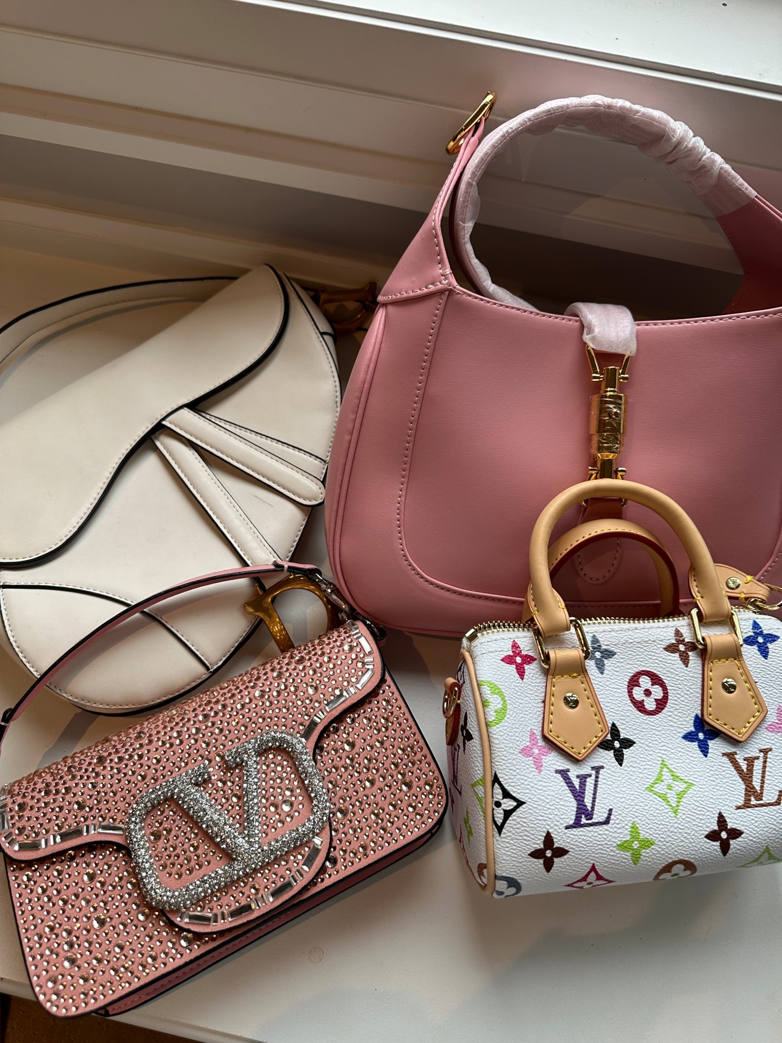 The perfect bags for summer🌸🫶🏼 Louis Vuitton mini speedy, Gucci jackie, Dior saddle bag, crystal Valentino  #LTKspring

#LTKbag #LTKsummer